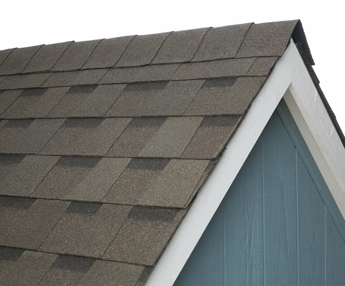 Blue house with Brown roof using Pinnacle Pristine HEATHERBLEND