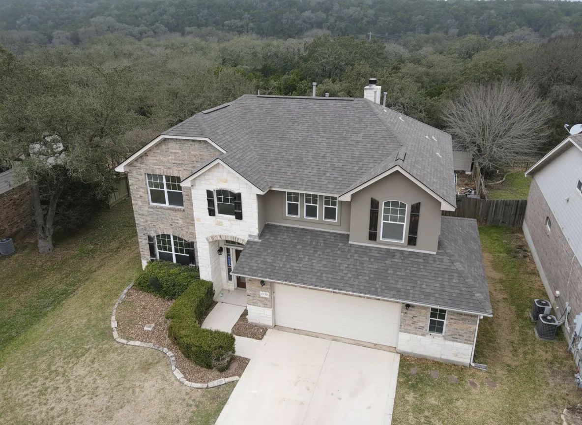 Gray house with Weathered Wood roof using Oakridge Driftwood