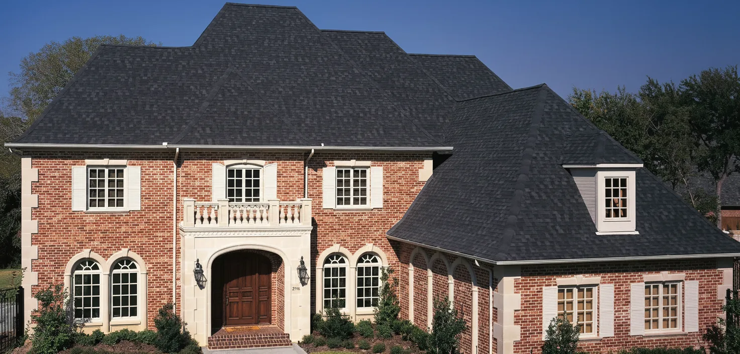 Light Gray house with Black roof using Heritage Rustic Black