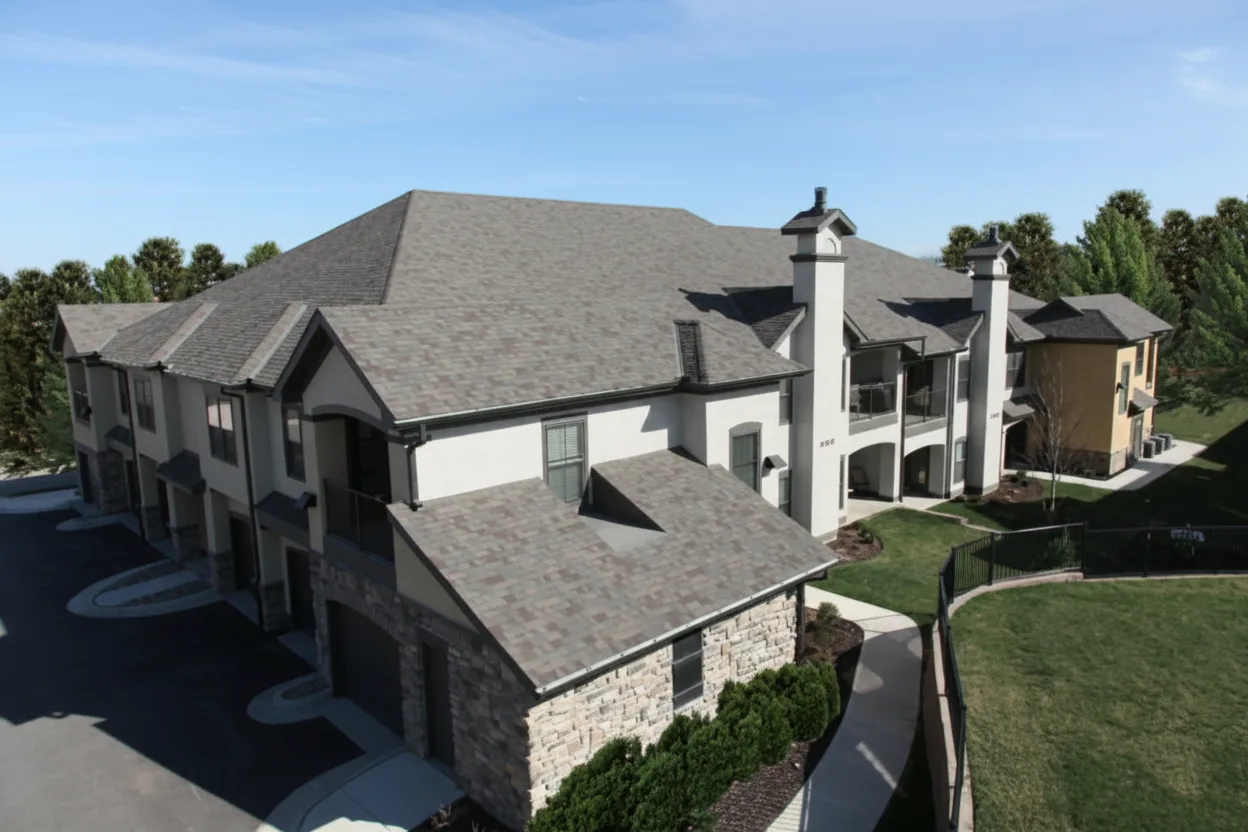 Light Gray house with Weathered Wood roof using Vista Natural Wood