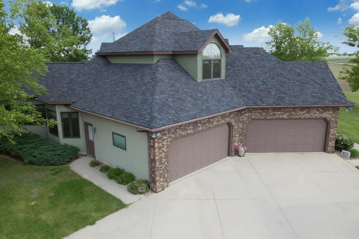 Sage Green house with Charcoal roof using Vista Black Oak