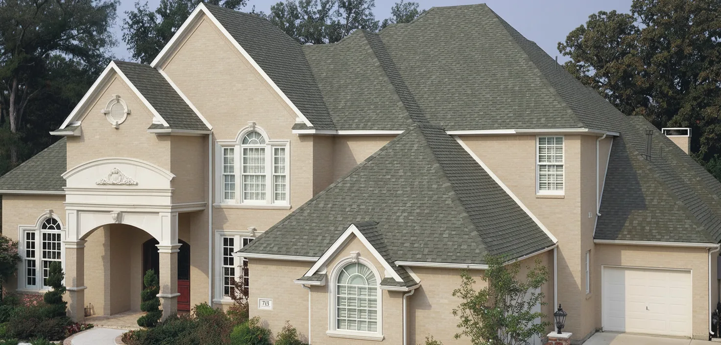 Tan house with Charcoal roof using Heritage Oxford Grey