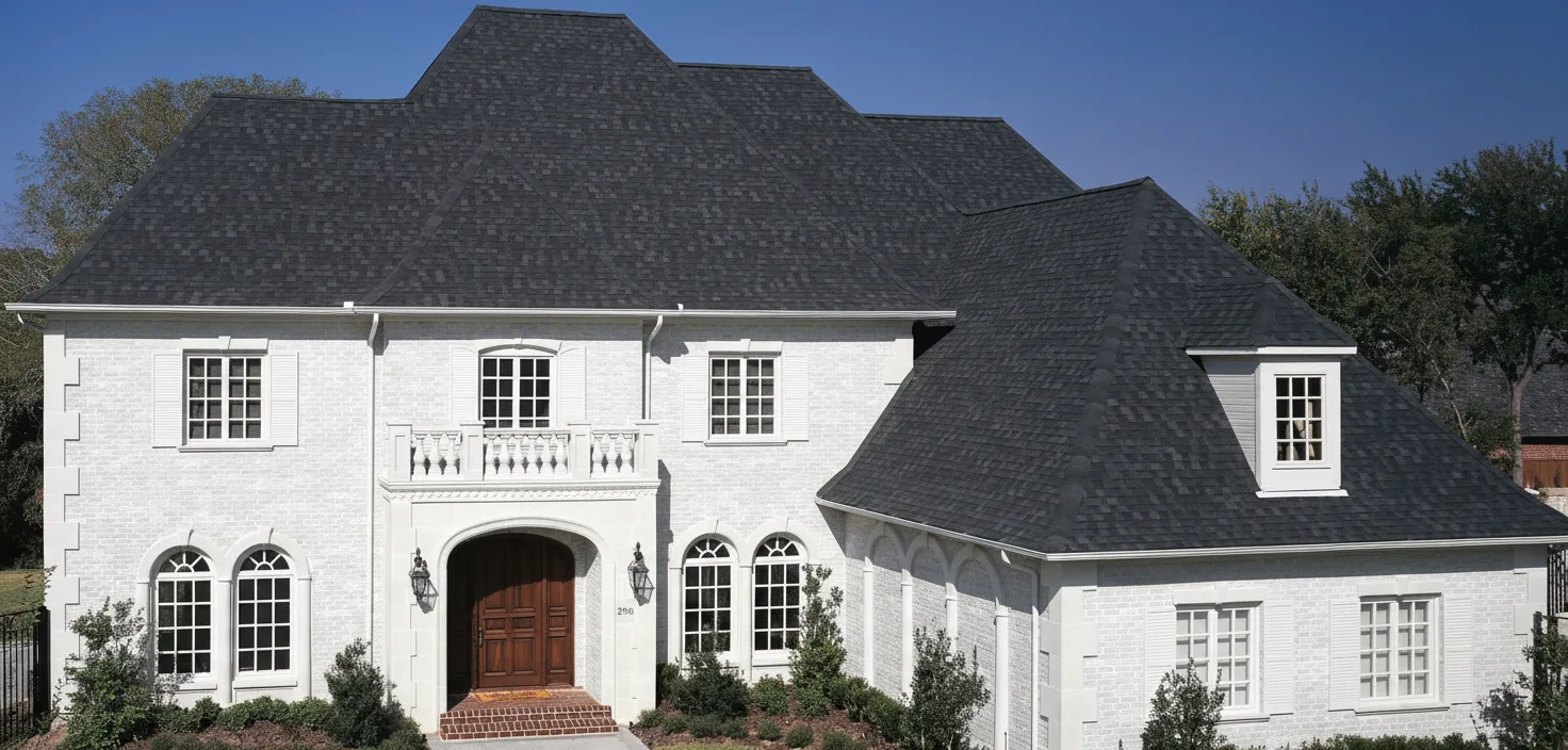 White house with Black roof using Heritage Rustic Black