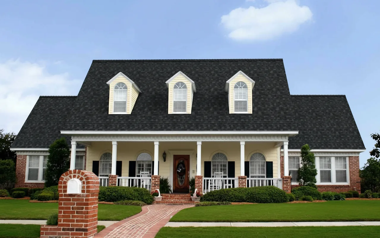 Yellow house with Black roof using Duration Onyx Black