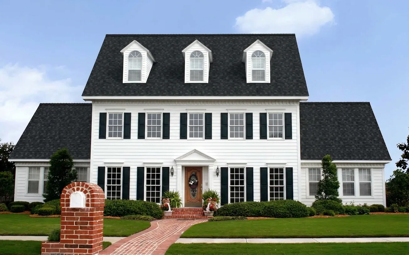 Colonial home with Black roof -- Owens Corning Duration Onyx Black (front)