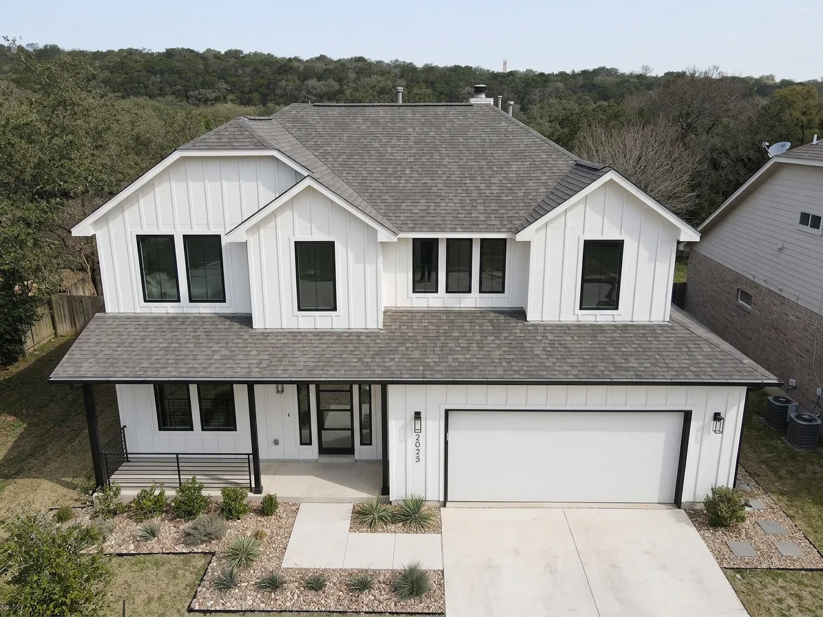 Modern Farmhouse home with Weathered Wood roof -- Owens Corning Oakridge Driftwood (front)