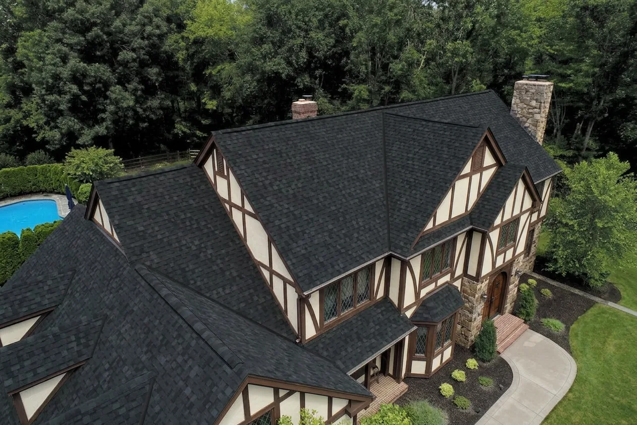 Tudor home with Black roof -- IKO Dynasty Granite Black (left-34)