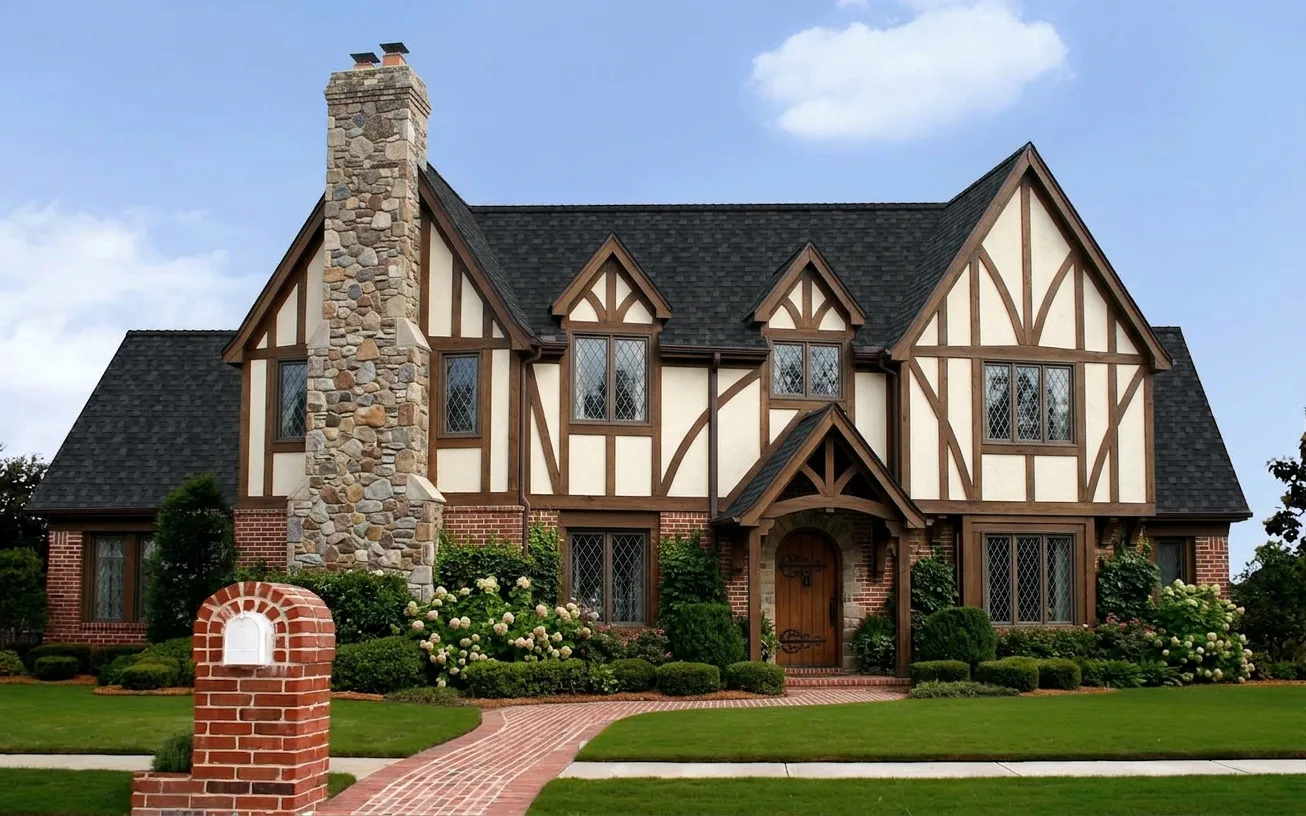 Tudor home with Black roof -- Owens Corning Duration Onyx Black (left-34)